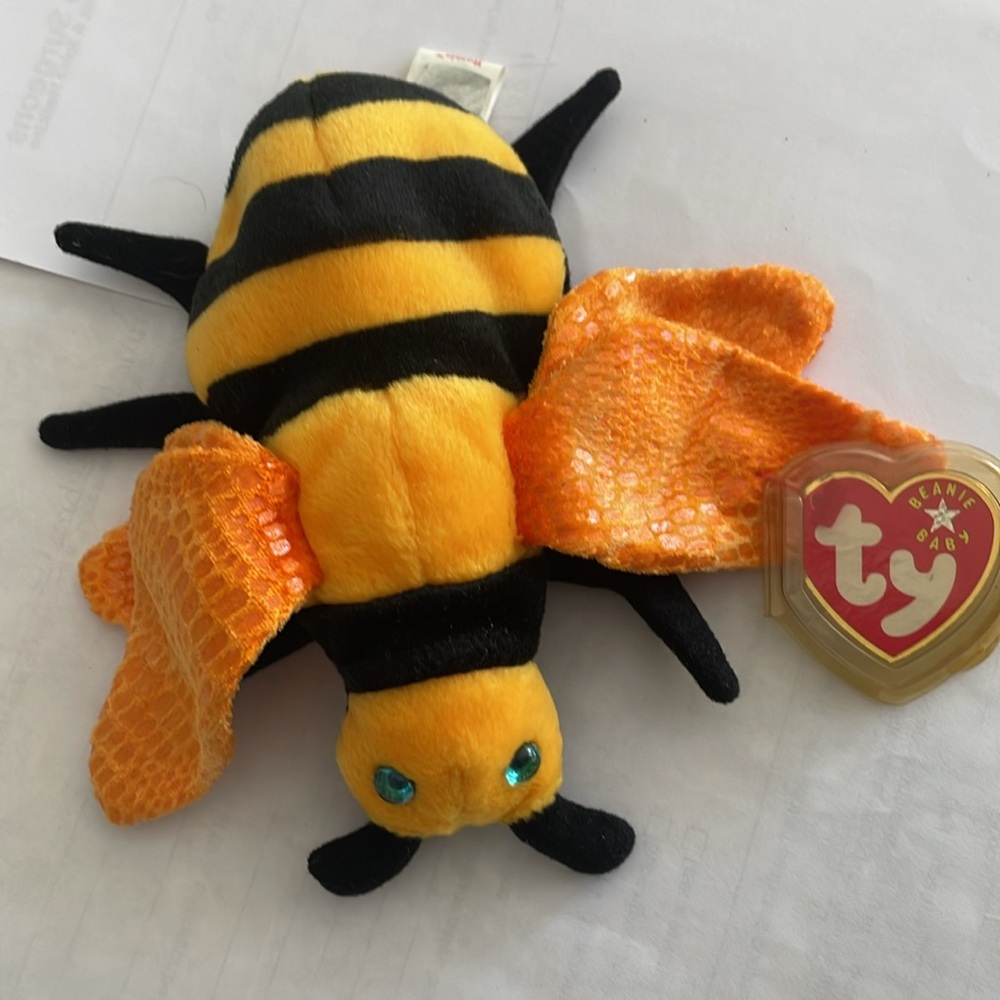 Ty - beanie baby – retired vintage Buzzie 
With several errors